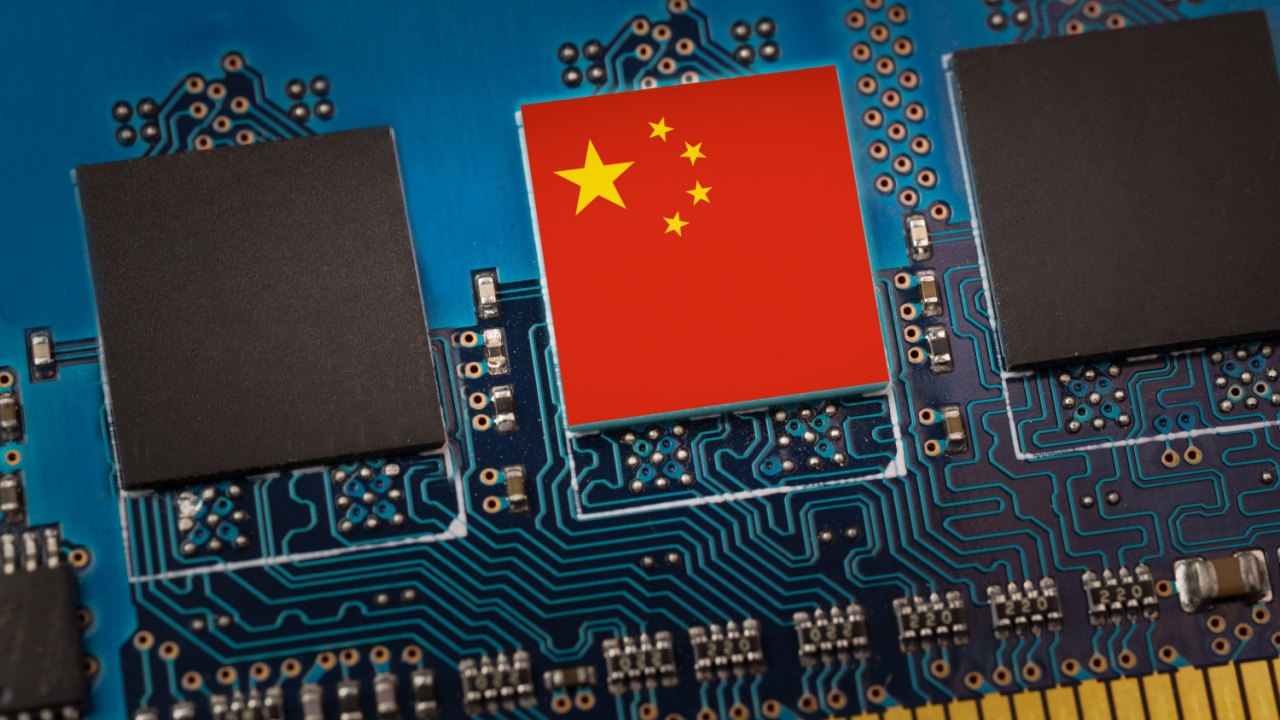China flag in the center of a circuit board. Concept of leadership in technology, artificial intelligence or digital cryptocurrencies.